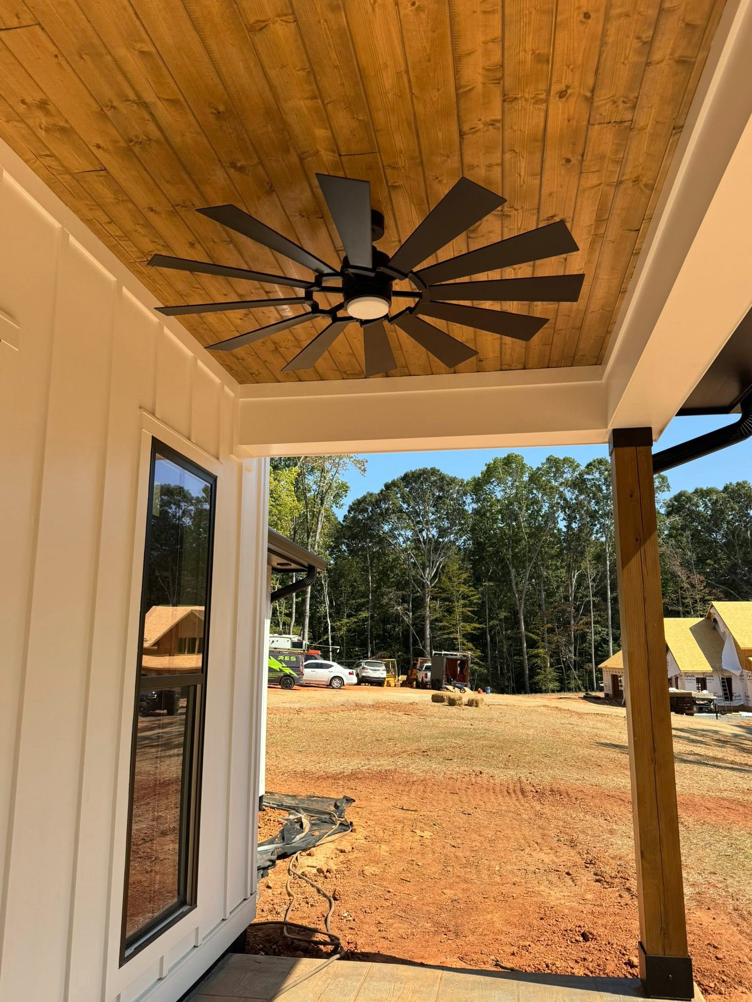 Mod Plan 041-216 covered porch with cedar ceiling and windmill fan